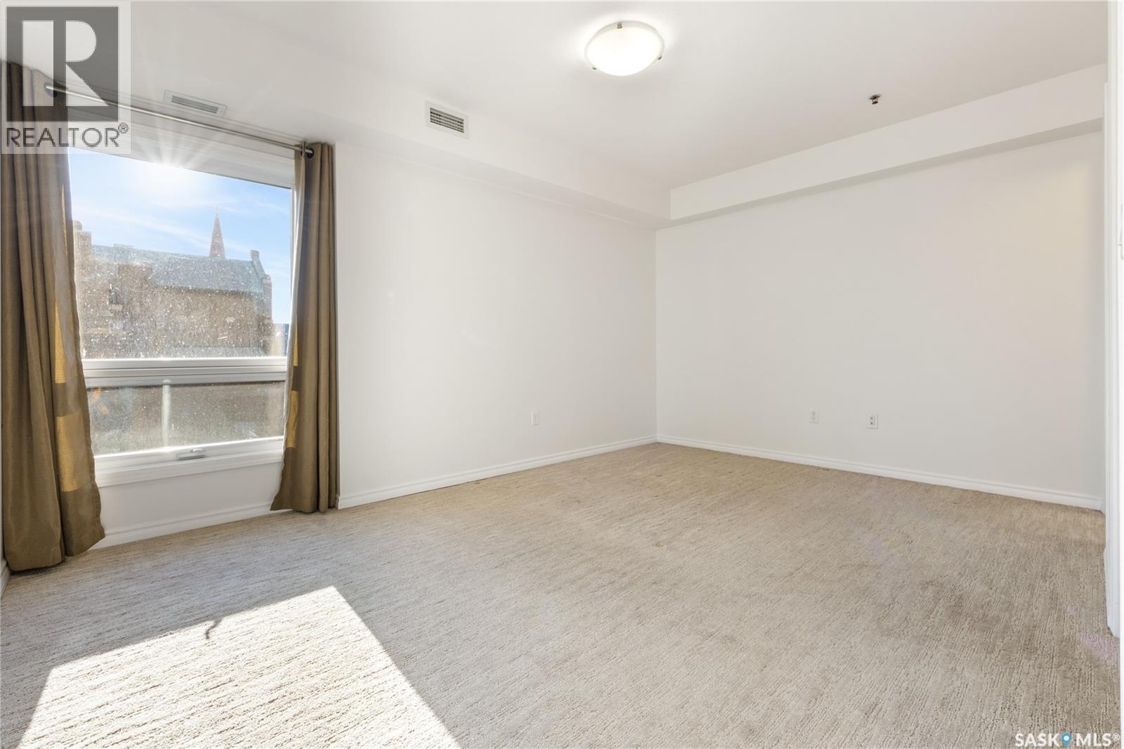 402 902 Spadina Crescent E, Saskatoon, SK - Indoor Photo Showing Other Room