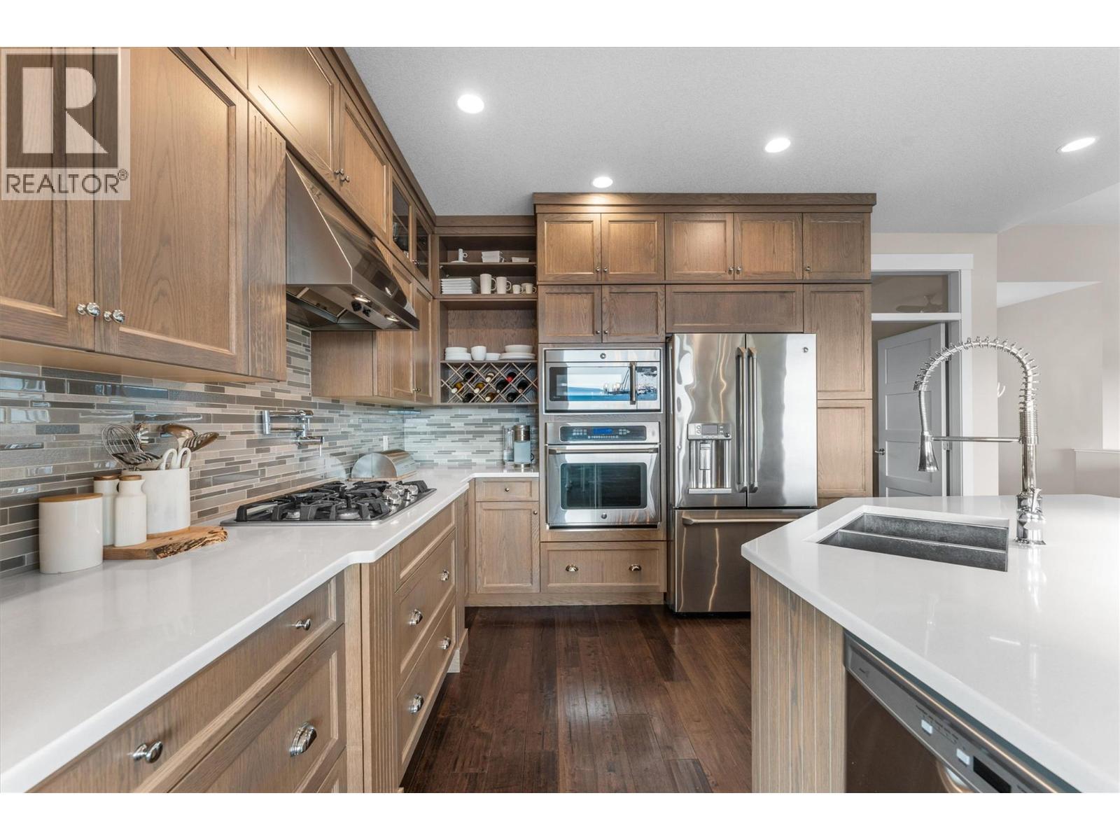GE Cafe Commercial Grade Appliances - 747 Traditions Crescent, Kelowna, BC - Indoor Photo Showing Kitchen With Upgraded Kitchen