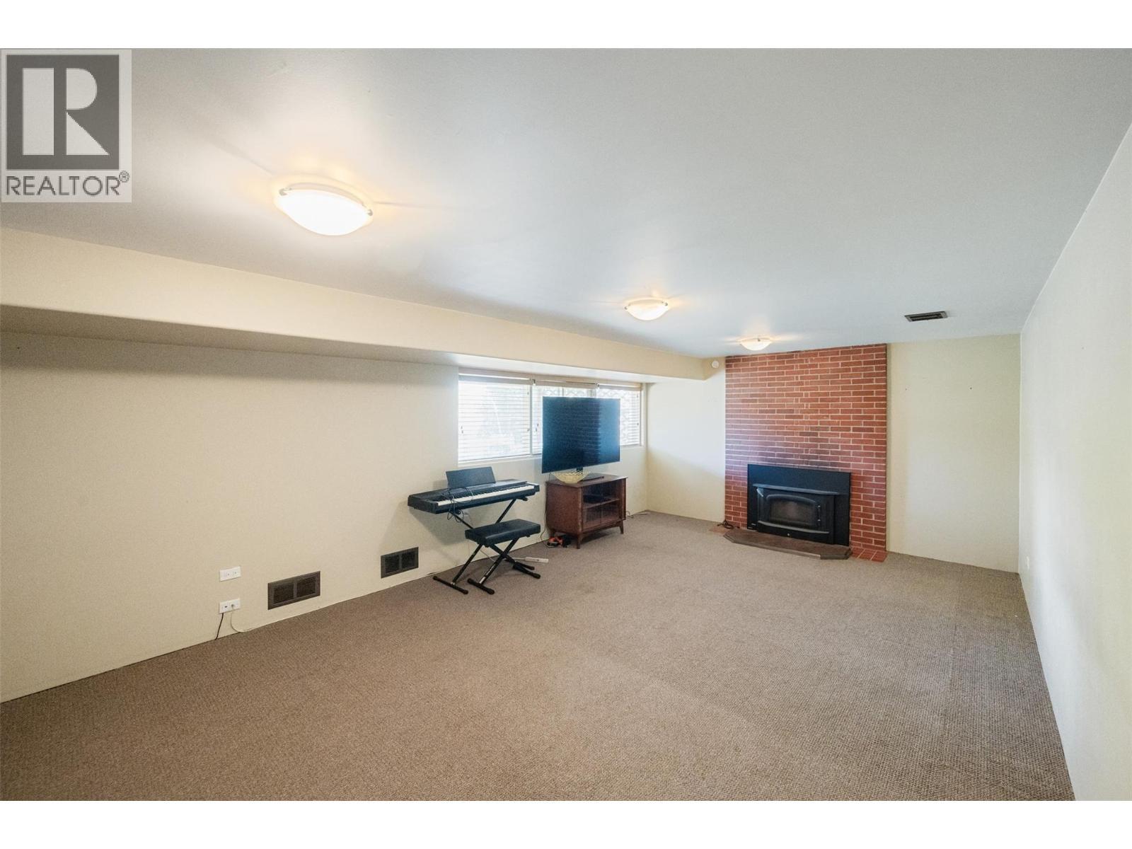 901 Newton Drive, Penticton, BC - Indoor With Fireplace