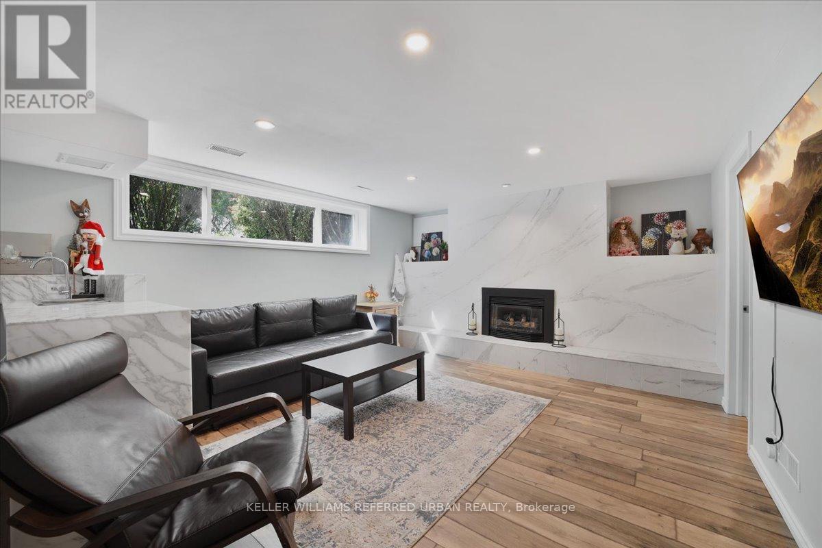 72 Cindy Drive, St. Catharines, ON - Indoor Photo Showing Living Room With Fireplace