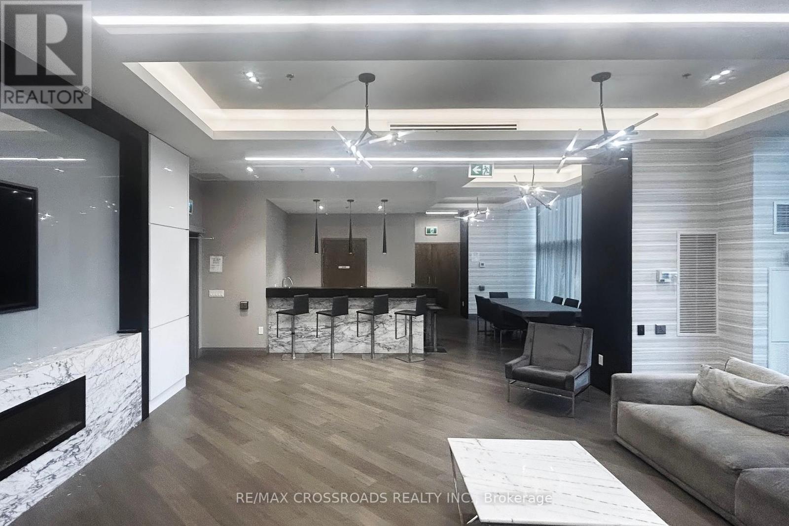 823 - 99 Eagle Rock Way, Vaughan, ON - Indoor With Fireplace