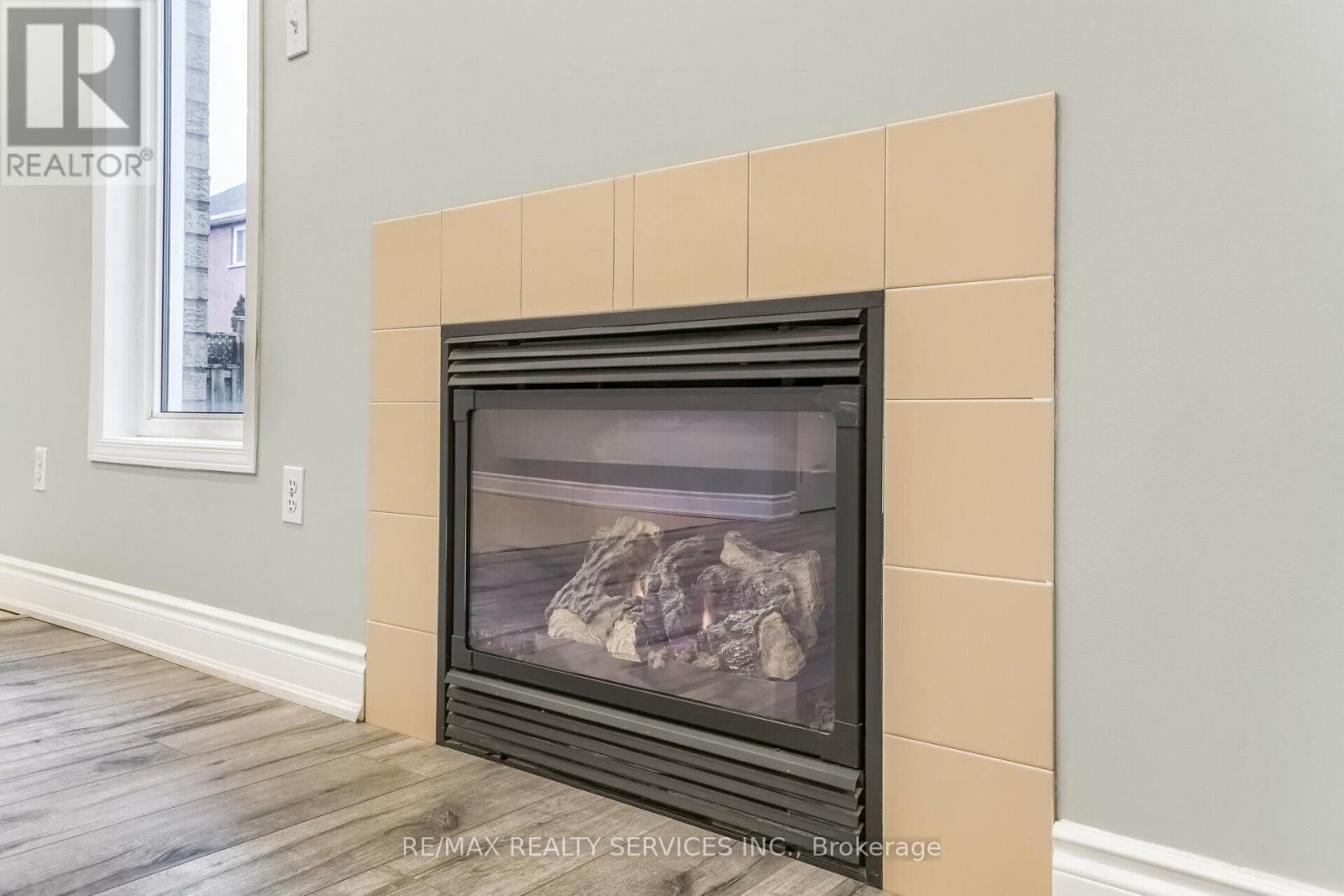 Upper - 15 Masters Green Crescent, Brampton, ON - Indoor Photo Showing Other Room With Fireplace