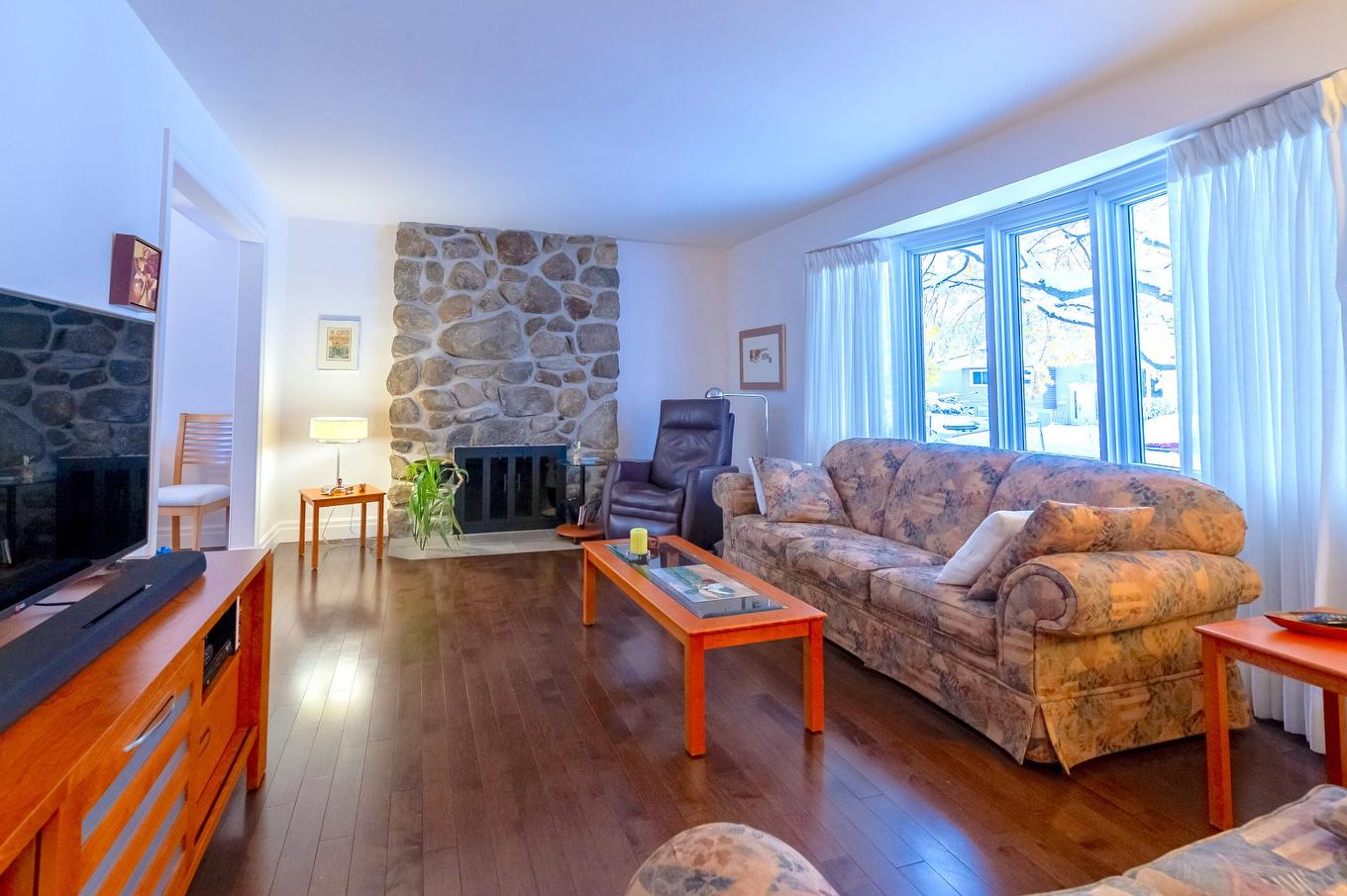 Living room - 3580 Rue Boulay, Brossard, QC - Indoor Photo Showing Living Room With Fireplace