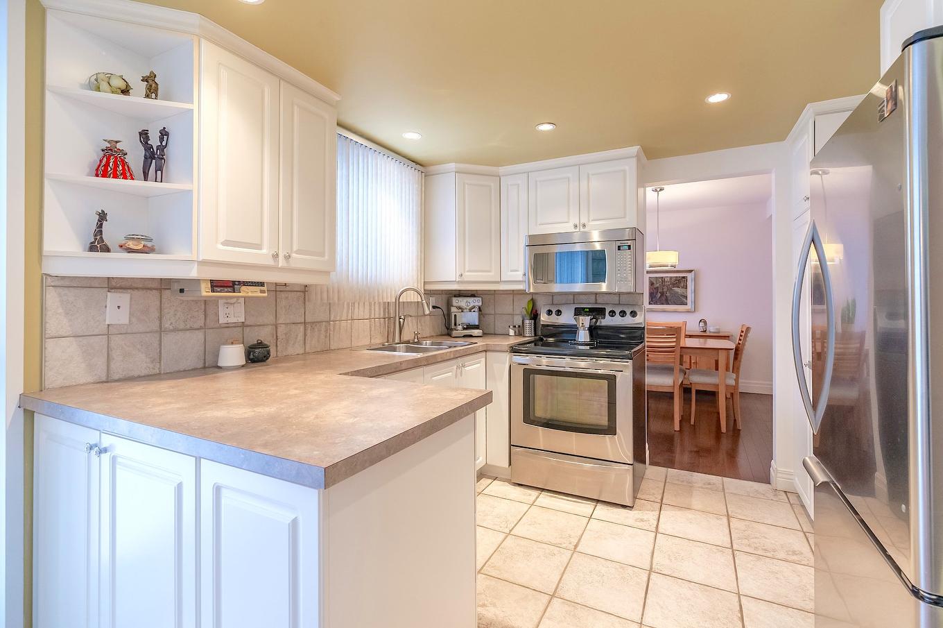Kitchen - 3580 Rue Boulay, Brossard, QC - Indoor Photo Showing Kitchen With Double Sink