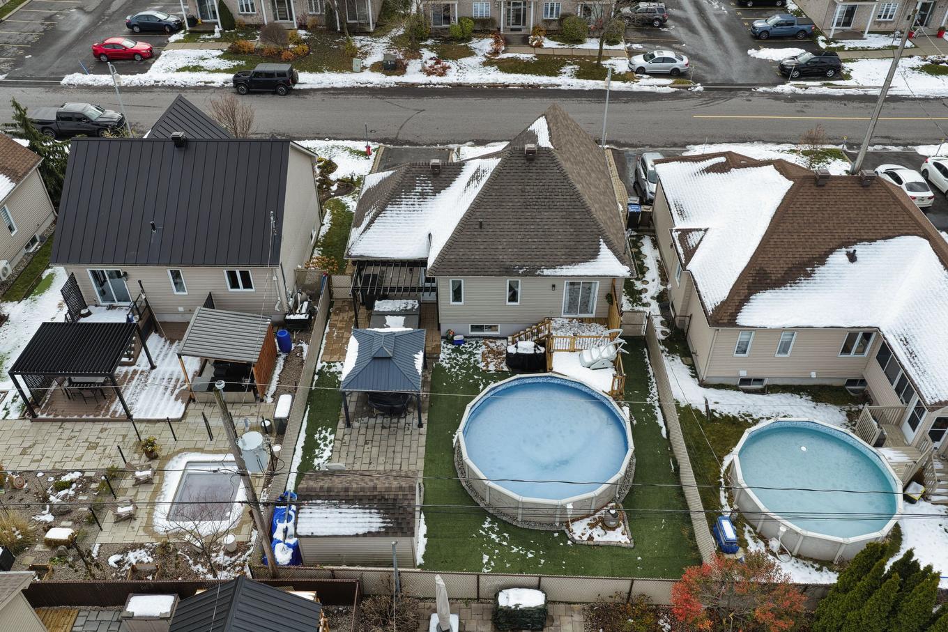 Overall view - 109 Rue Joseph-Charles-Coallier, Saint-Jean-Sur-Richelieu, QC - Outdoor With Above Ground Pool