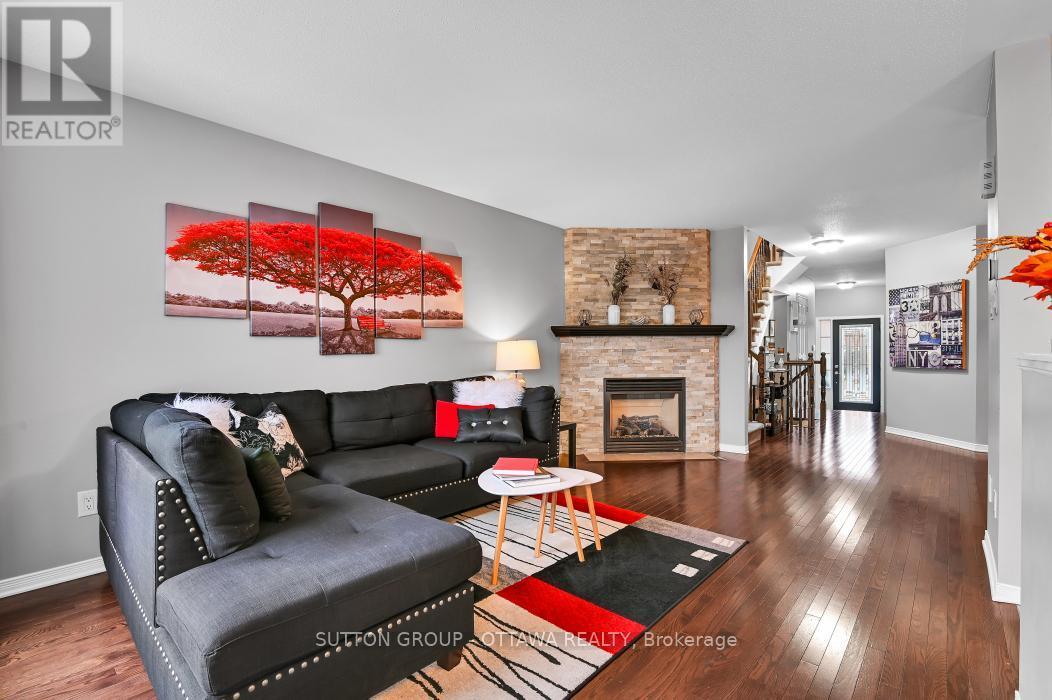 214 Trail Side Circle, Ottawa, ON - Indoor Photo Showing Living Room With Fireplace