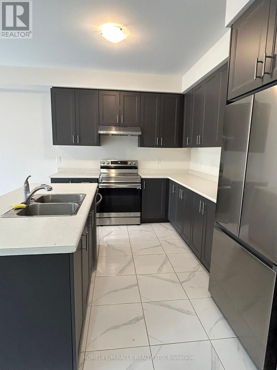 11 Federica Crescent W, Wasaga Beach, ON - Indoor Photo Showing Kitchen With Stainless Steel Kitchen With Double Sink