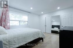 Sun-filled renovated master bedroom -