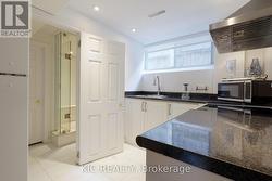 Spacious lower-level full kitchen -