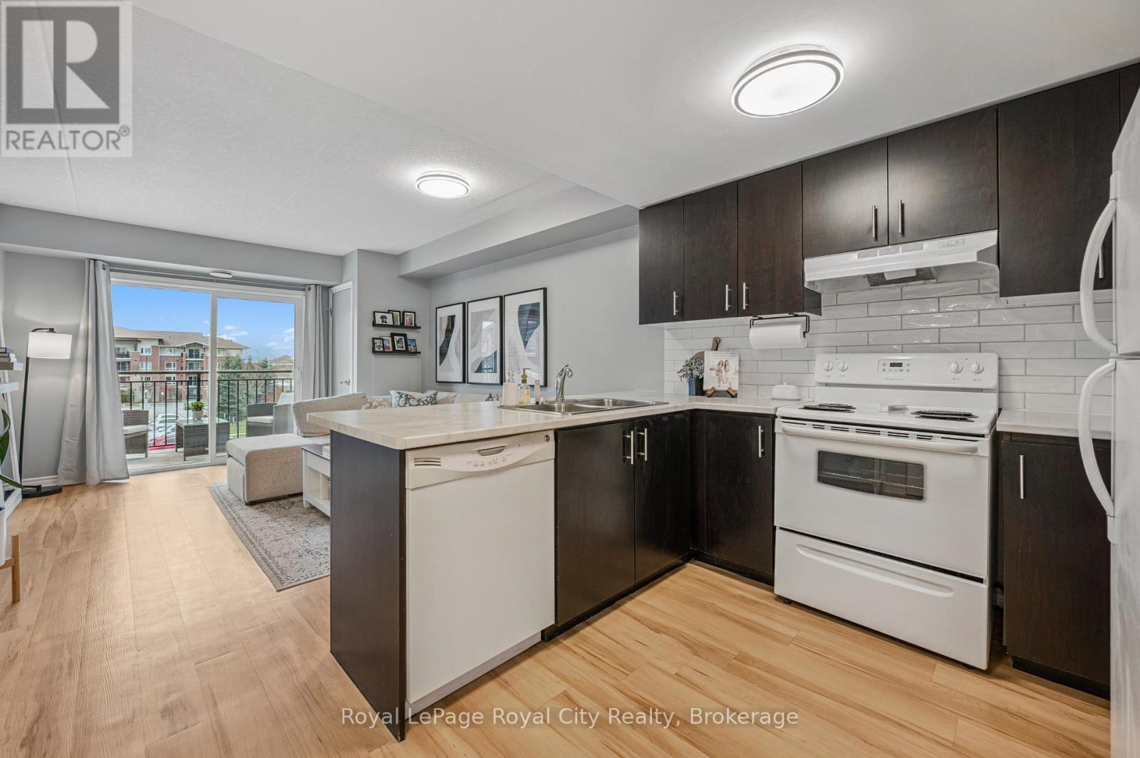 309 - 41 Goodwin Drive, Guelph (Pineridge/Westminster Woods), ON - Indoor Photo Showing Kitchen With Double Sink