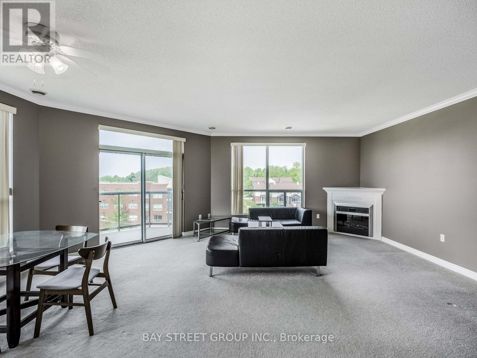606 - 255 Keats Way, Waterloo, ON - Indoor Photo Showing Other Room With Fireplace