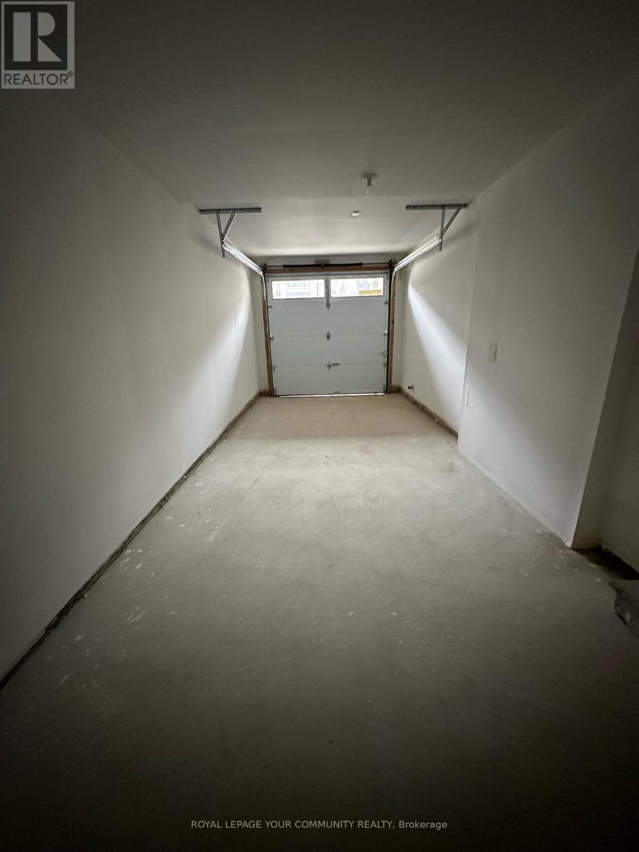 1551 Moonseed Place, Milton, ON - Indoor Photo Showing Garage