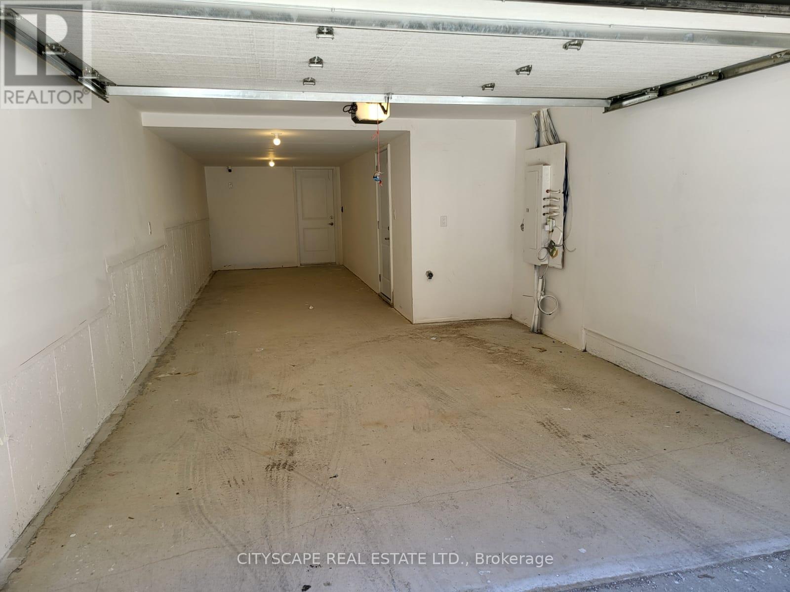 34 - 20 Lunar Crescent, Mississauga, ON - Indoor Photo Showing Garage