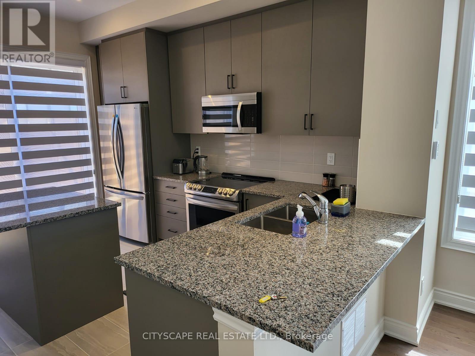 34 - 20 Lunar Crescent, Mississauga, ON - Indoor Photo Showing Kitchen With Stainless Steel Kitchen With Double Sink With Upgraded Kitchen