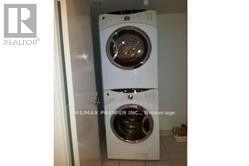 407 - 8 Scollard Street, Toronto, ON - Indoor Photo Showing Laundry Room