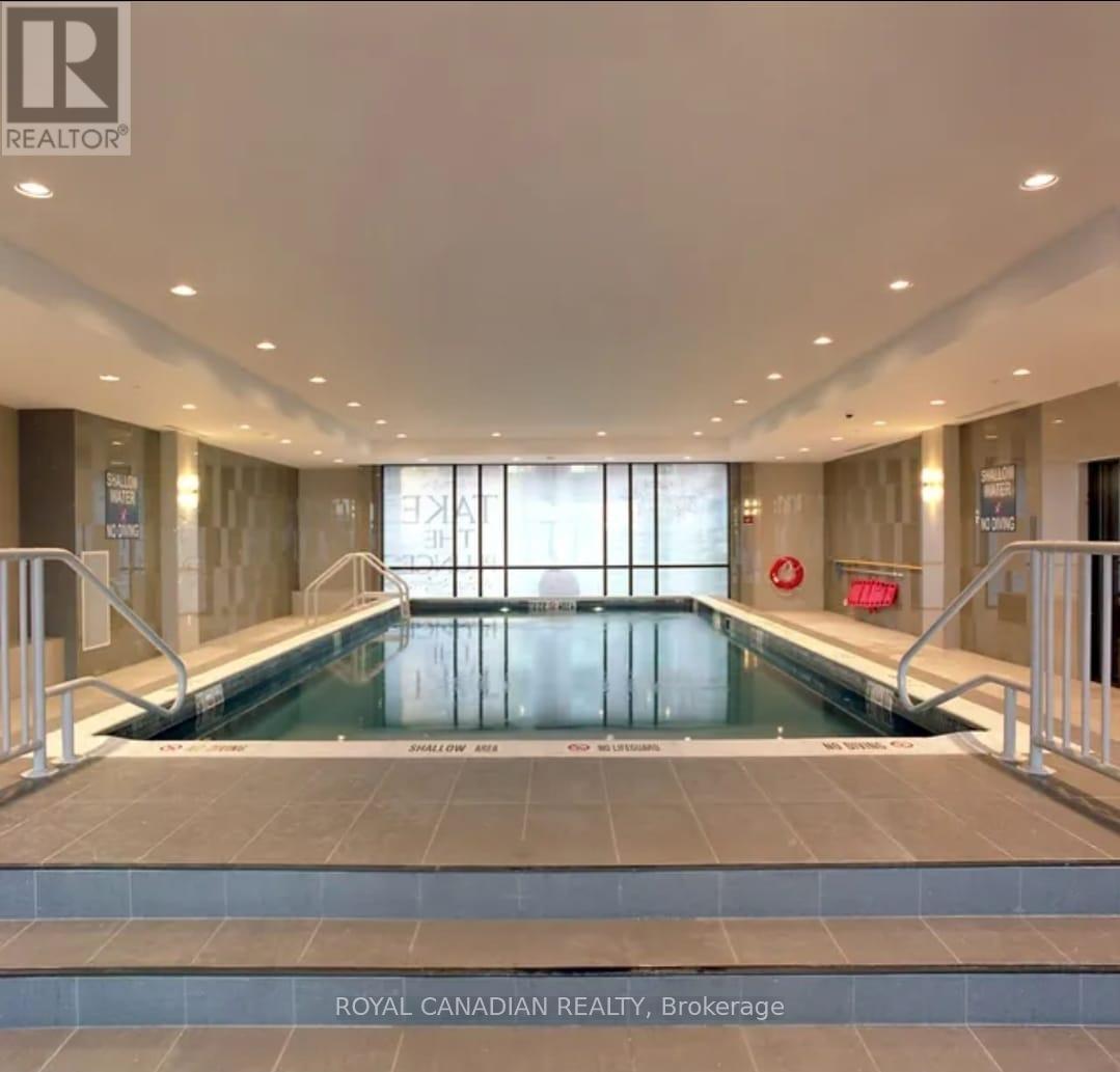 913 - 150 Main Street W, Hamilton, ON - Indoor Photo Showing Other Room With In Ground Pool