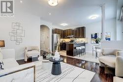 Spacious family room with fireplace. Open Concept -