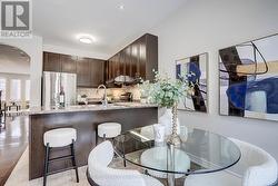 Kitchen overlook family room with open concept -