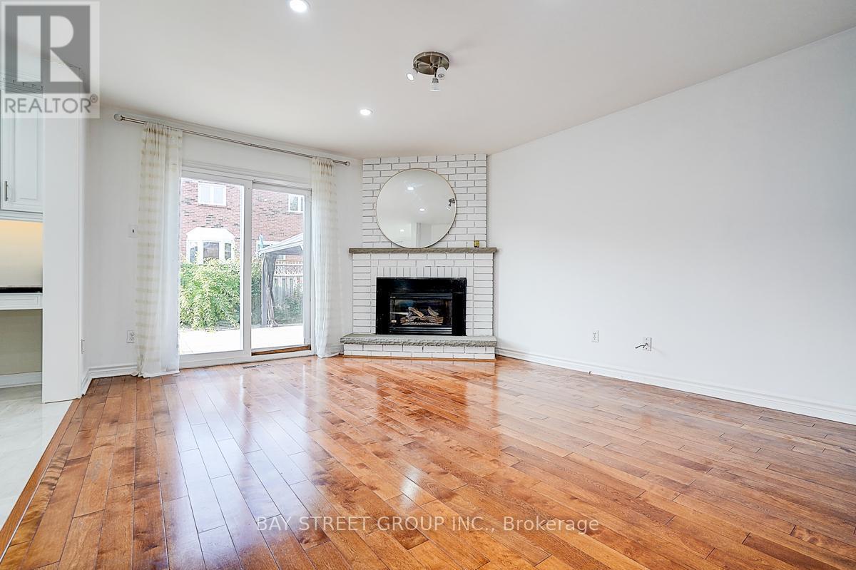 8 Muster Court, Markham, ON - Indoor Photo Showing Living Room With Fireplace