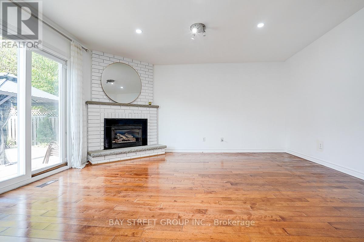 8 Muster Court, Markham, ON - Indoor Photo Showing Living Room With Fireplace
