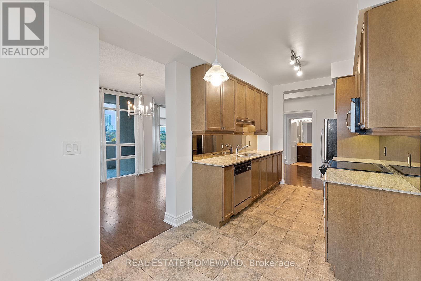 714 - 10 Bloorview Place, Toronto, ON - Indoor Photo Showing Kitchen