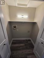 Well-lit Main Floor laundry room. Attic access -