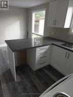 Granite Counter top. Ready for new dishwasher -