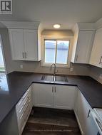 Well lit, new double sink -