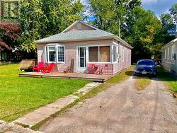 Nice long driveway easily fitting 3 cars. -