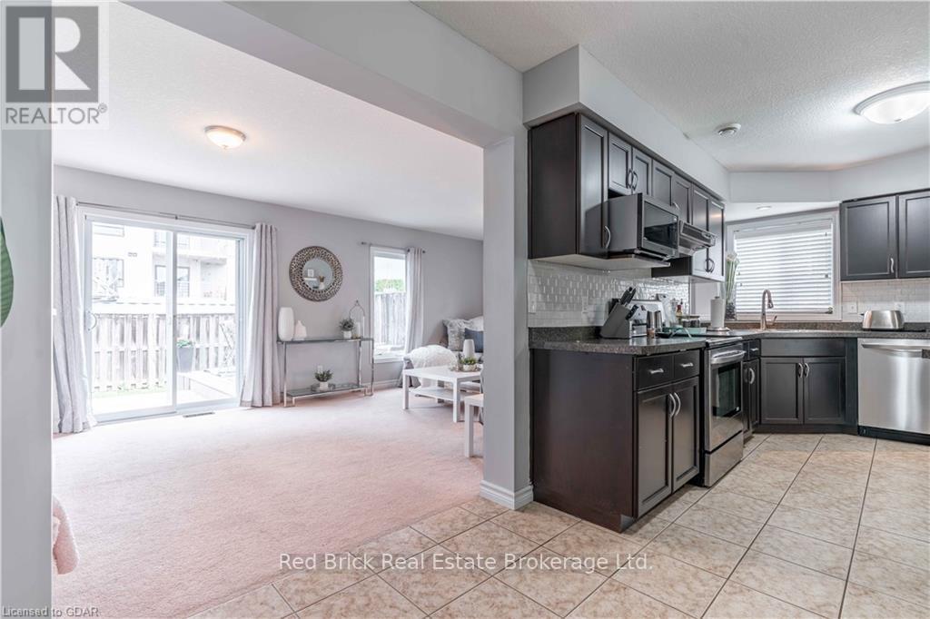 24 - 20 Shackleton Drive, Guelph (Grange Road), ON - Indoor Photo Showing Kitchen With Stainless Steel Kitchen