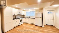 Basement Kitchen and Dining Area -