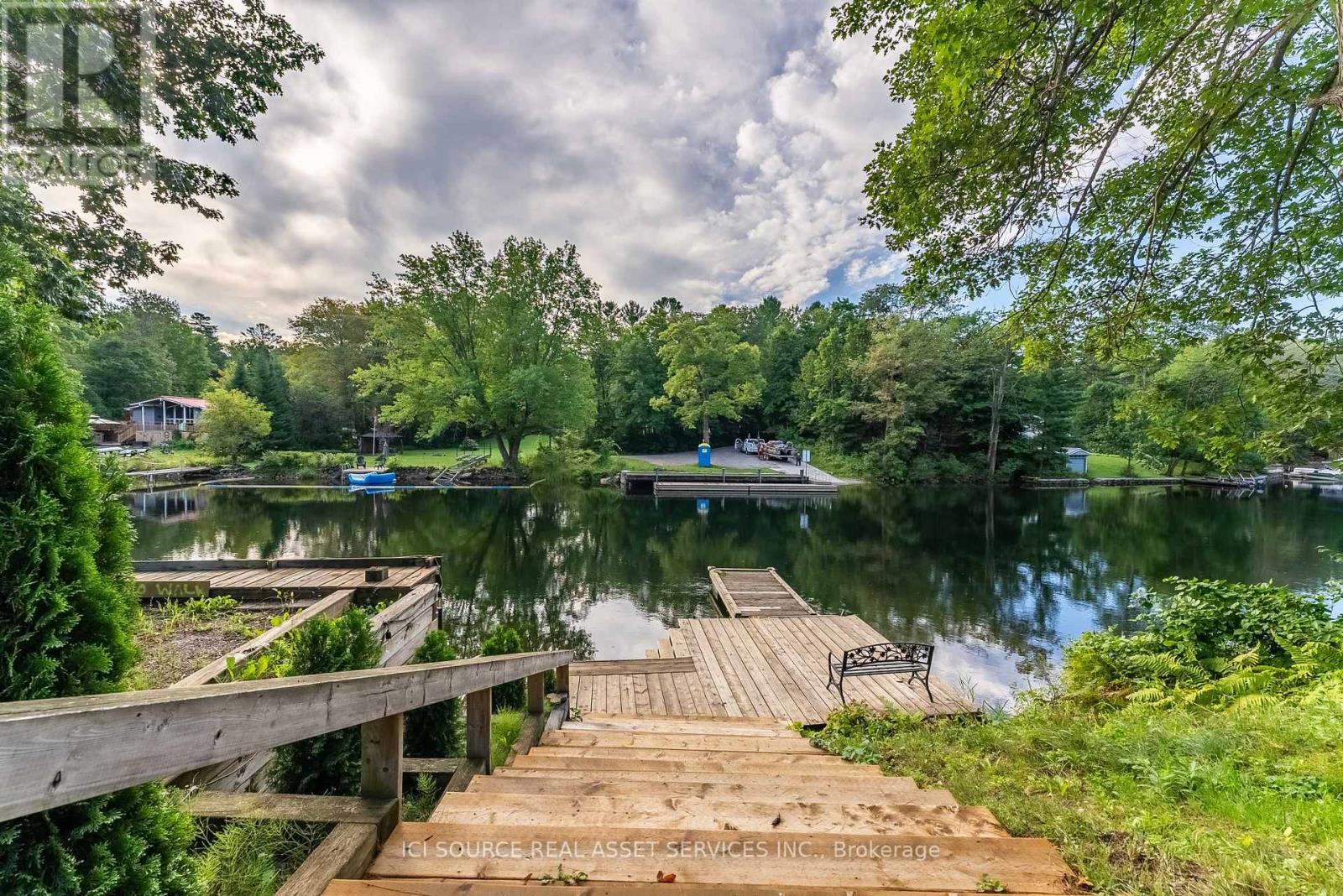 3526 Monck Road, Kawartha Lakes, ON - Outdoor With Body Of Water With Deck Patio Veranda
