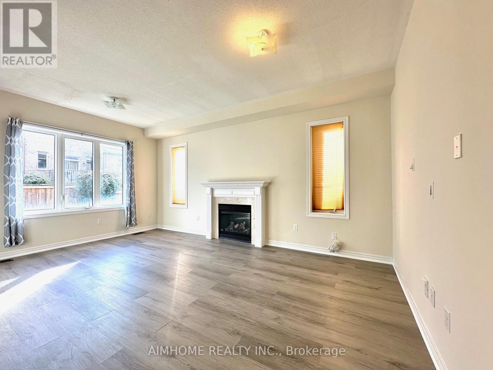 1171 Mctavish Drive, Newmarket, ON - Indoor Photo Showing Living Room With Fireplace