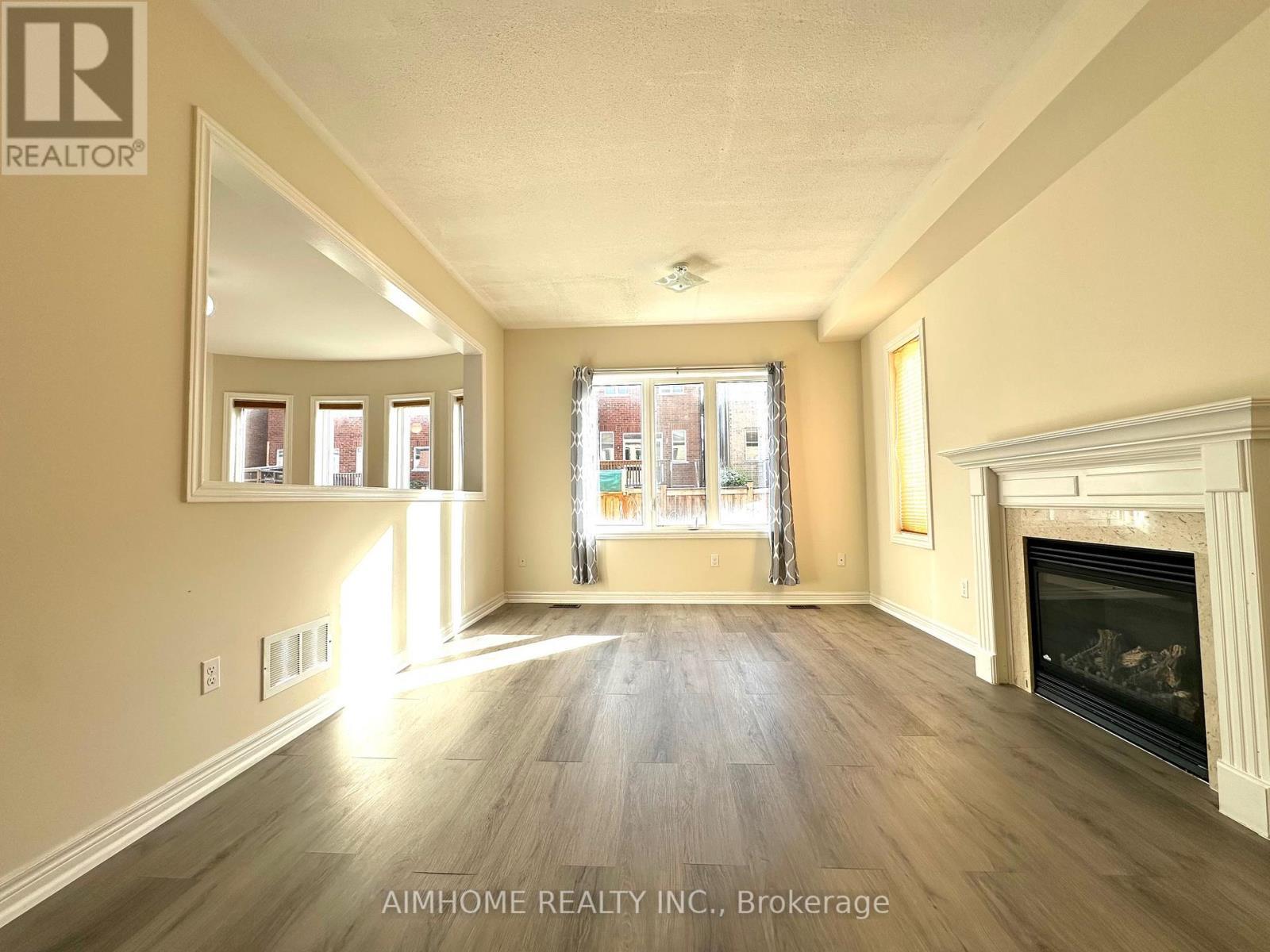 1171 Mctavish Drive, Newmarket, ON - Indoor Photo Showing Living Room With Fireplace