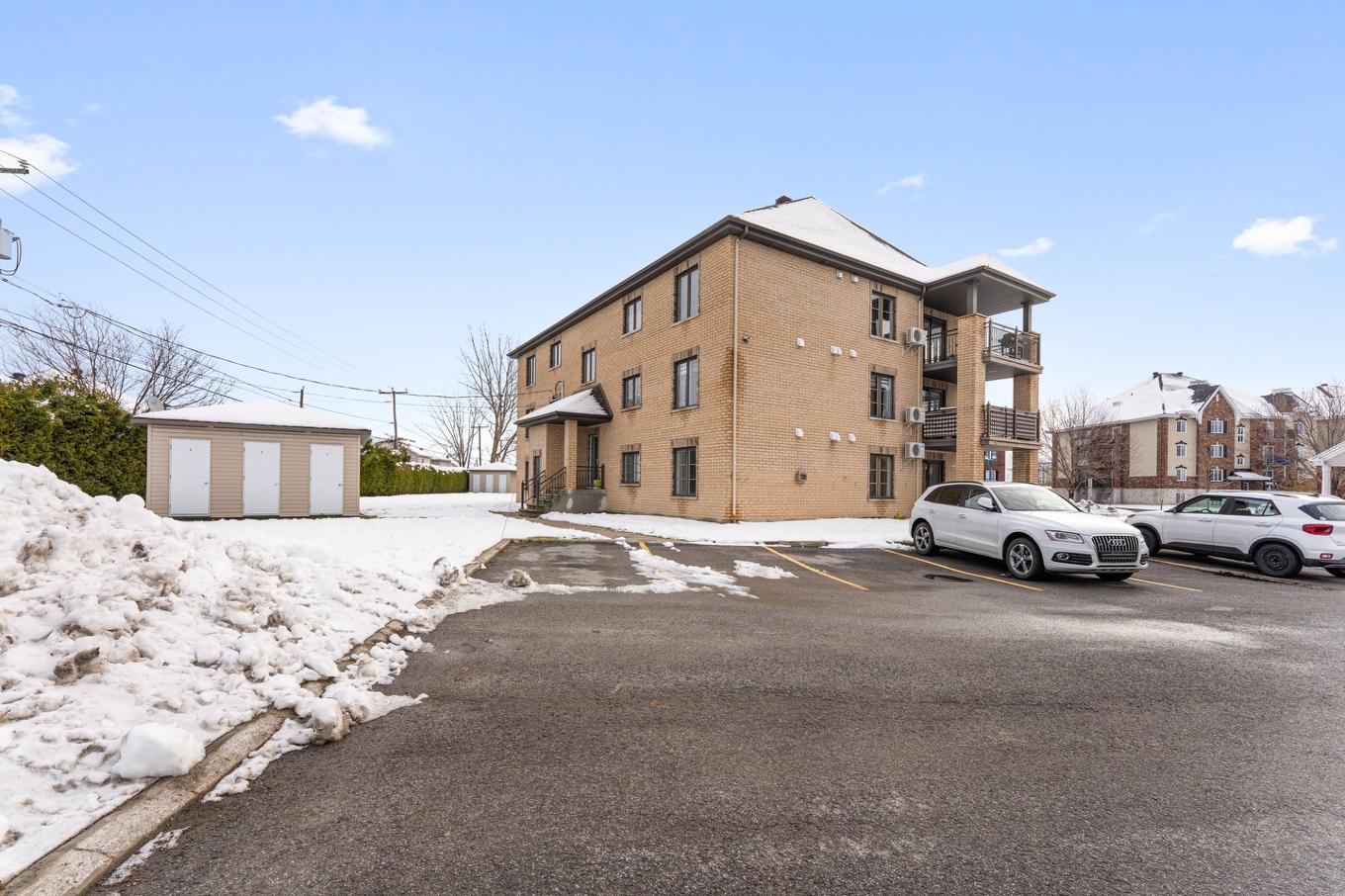 Back facade - 5-385 Rue Dalpé, Mascouche, QC - Outdoor