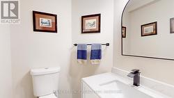 MAIN FLOOR TWO PIECE POWDER ROOM -