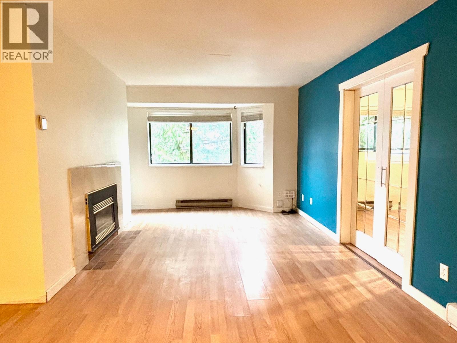 11 4832 Lazelle Avenue, Terrace, BC - Indoor With Fireplace