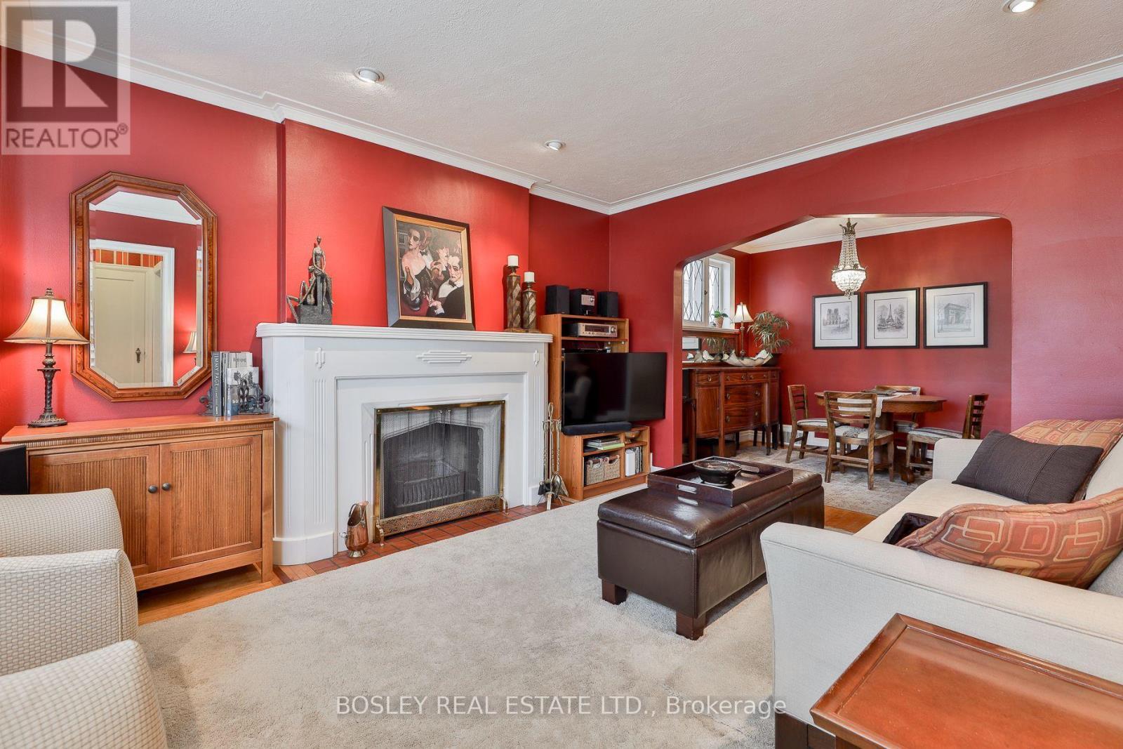 333 Sutherland Drive, Toronto, ON - Indoor Photo Showing Living Room With Fireplace