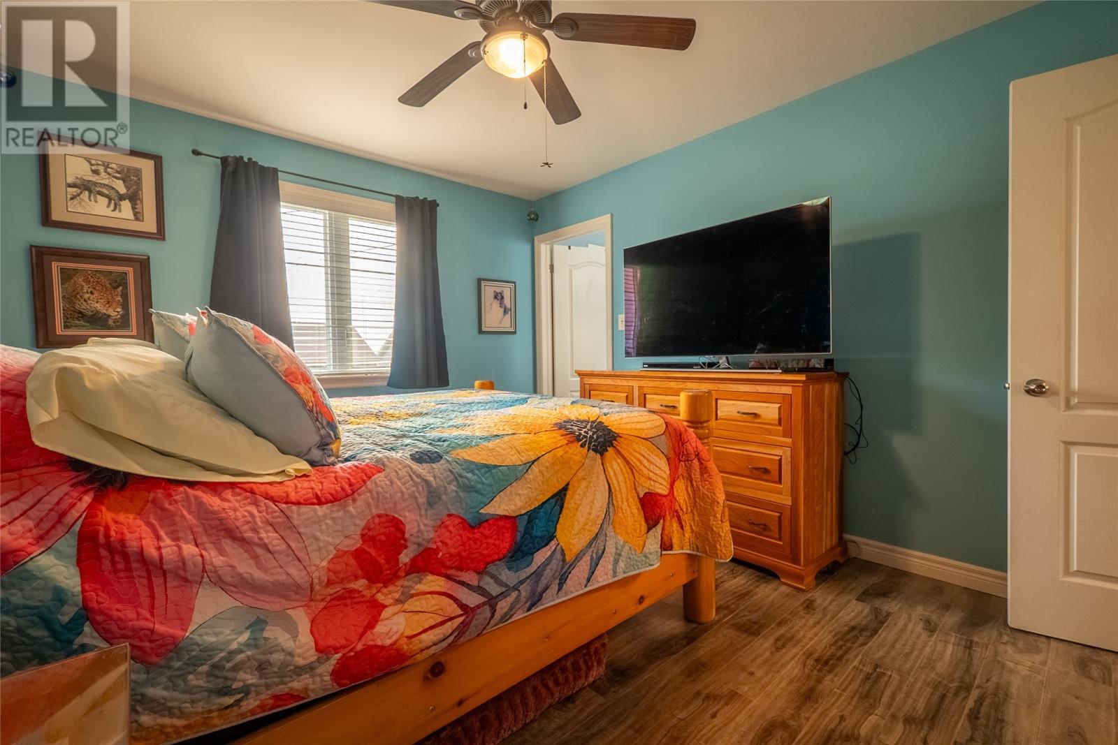 12 Bridgeport Street, Paradise, NL - Indoor Photo Showing Bedroom With Fireplace