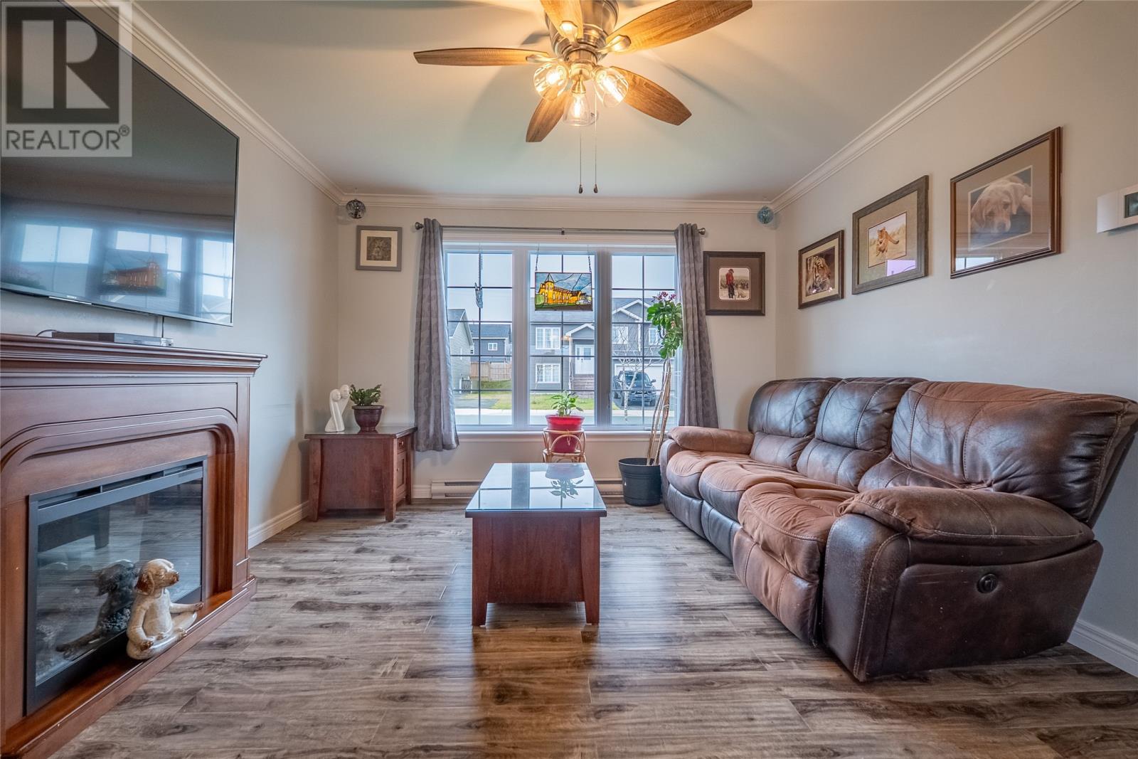12 Bridgeport Street, Paradise, NL - Indoor Photo Showing Living Room With Fireplace