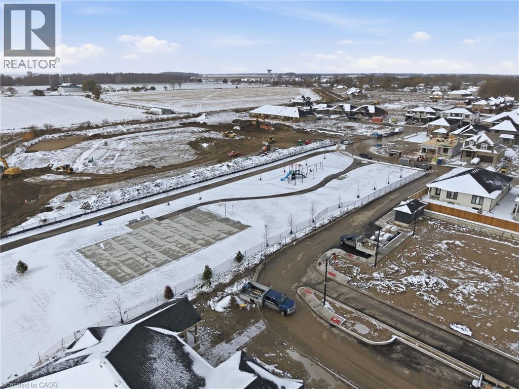 Snowy aerial view featuring a residential view - 29 Weymouth Street Unit# 25, Elmira, ON - Outdoor With View