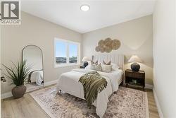 Bedroom featuring light wood-style floors -