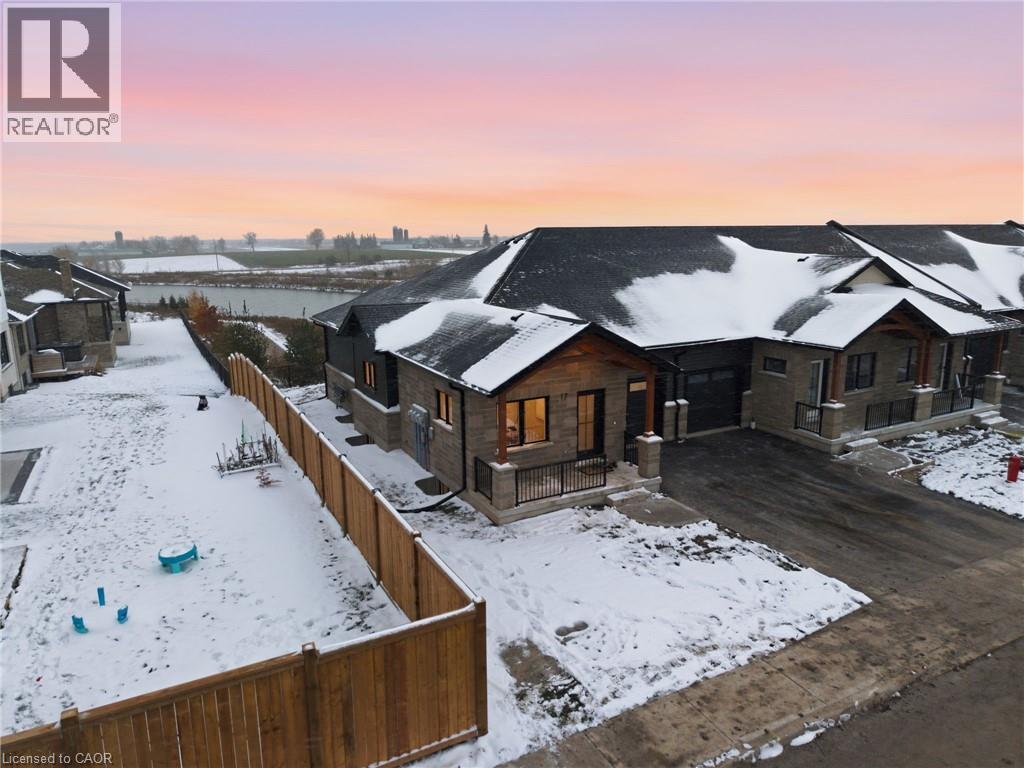 View of front of house with a deck - 29 Weymouth Street Unit# 17, Elmira, ON - Outdoor