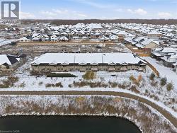 Snowy aerial view with a residential view -