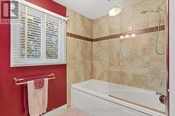 Upper main bathroom with tub & shower -