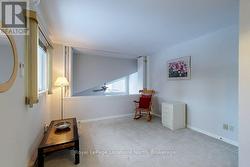 2nd bedroom overlooking lower level -