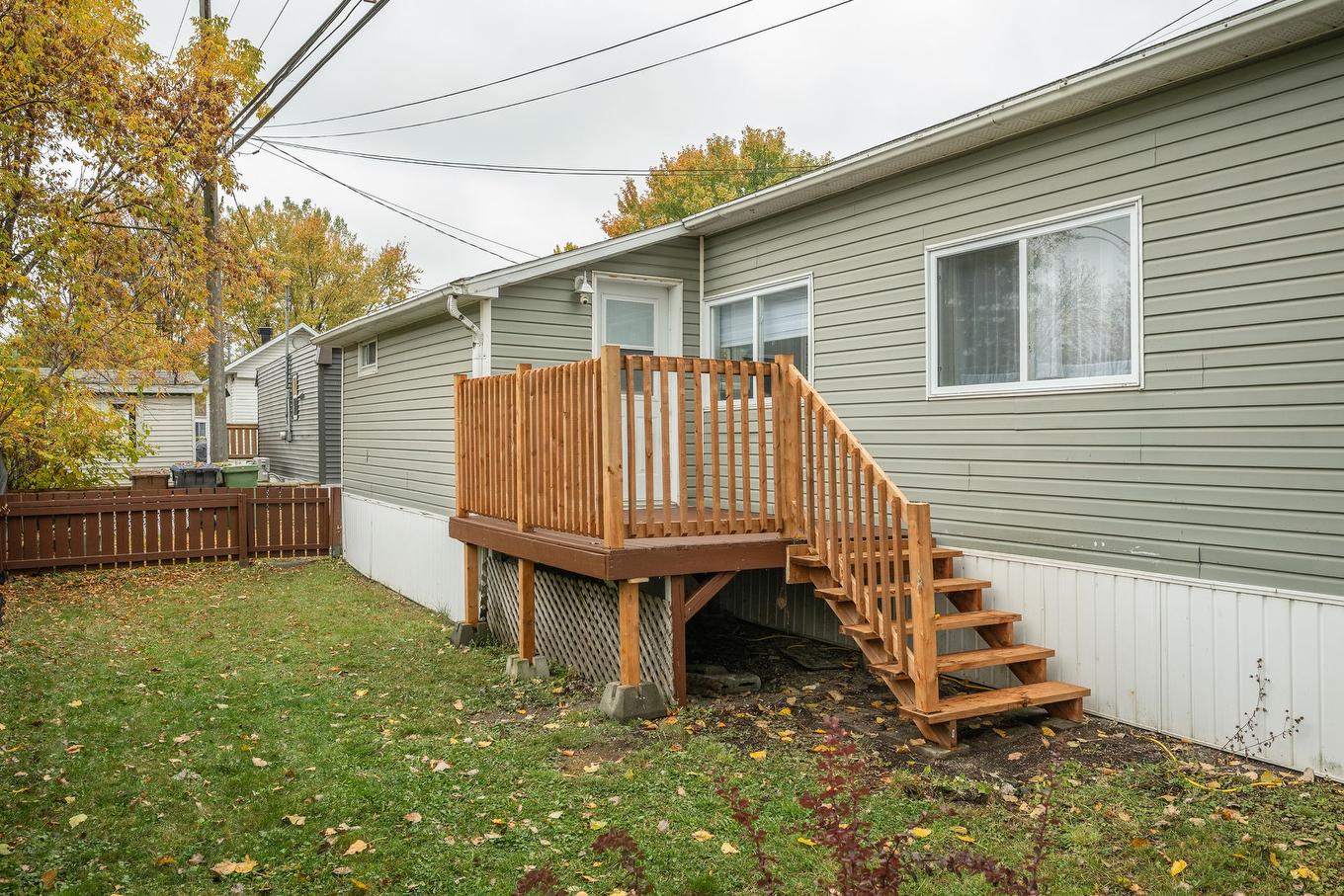 Back facade - 66 Rue Jacqueline, Saint-Jean-Sur-Richelieu, QC - Outdoor With Deck Patio Veranda With Exterior