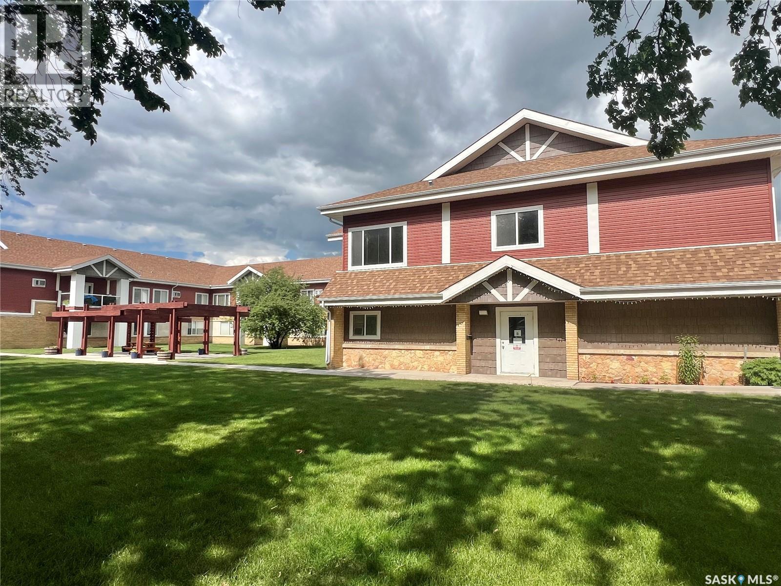 112 302 Bemister Avenue E, Melfort, SK - Outdoor With Deck Patio Veranda