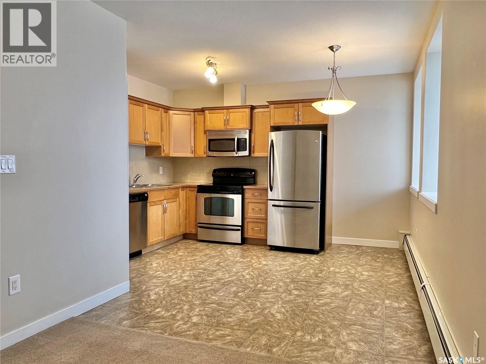 112 302 Bemister Avenue E, Melfort, SK - Indoor Photo Showing Kitchen