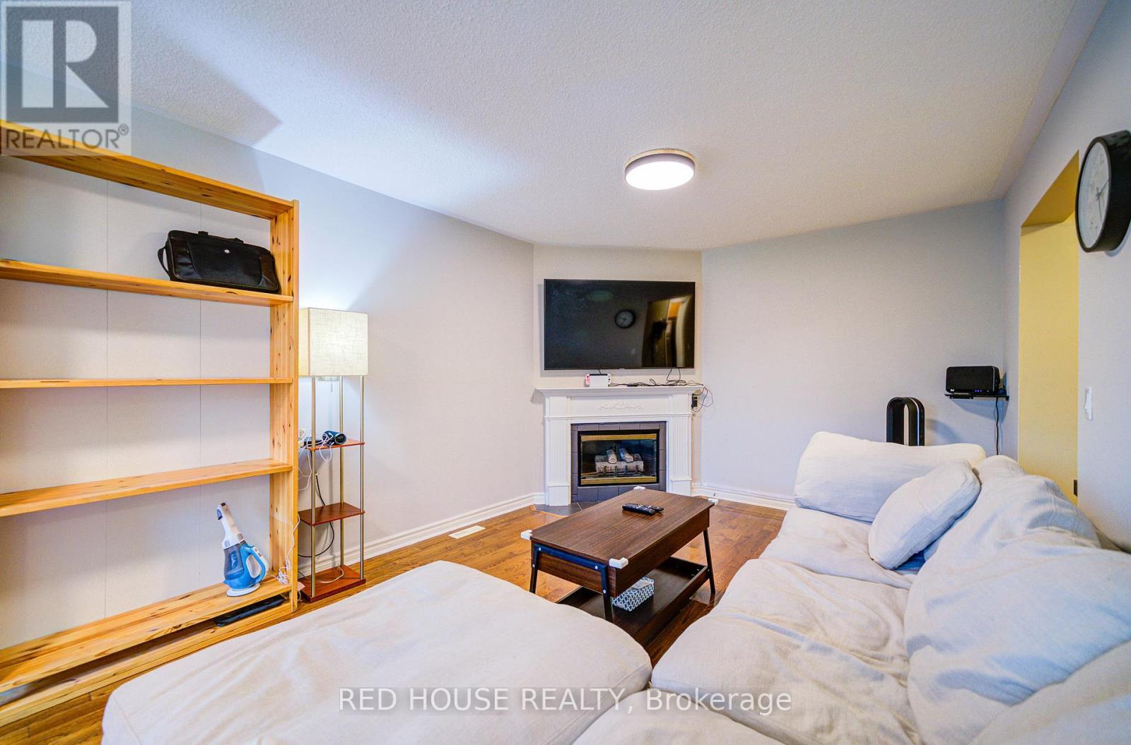 48 Heathcliffe Square, Brampton, ON - Indoor Photo Showing Other Room With Fireplace